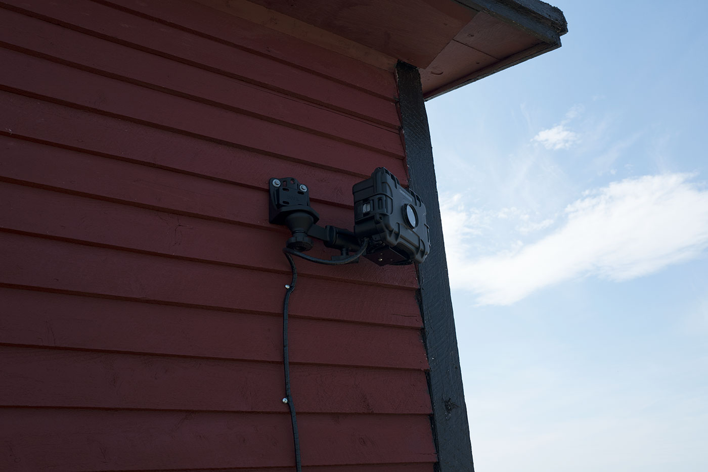 Cam Do weatherproof enclosure mounted on the cabin